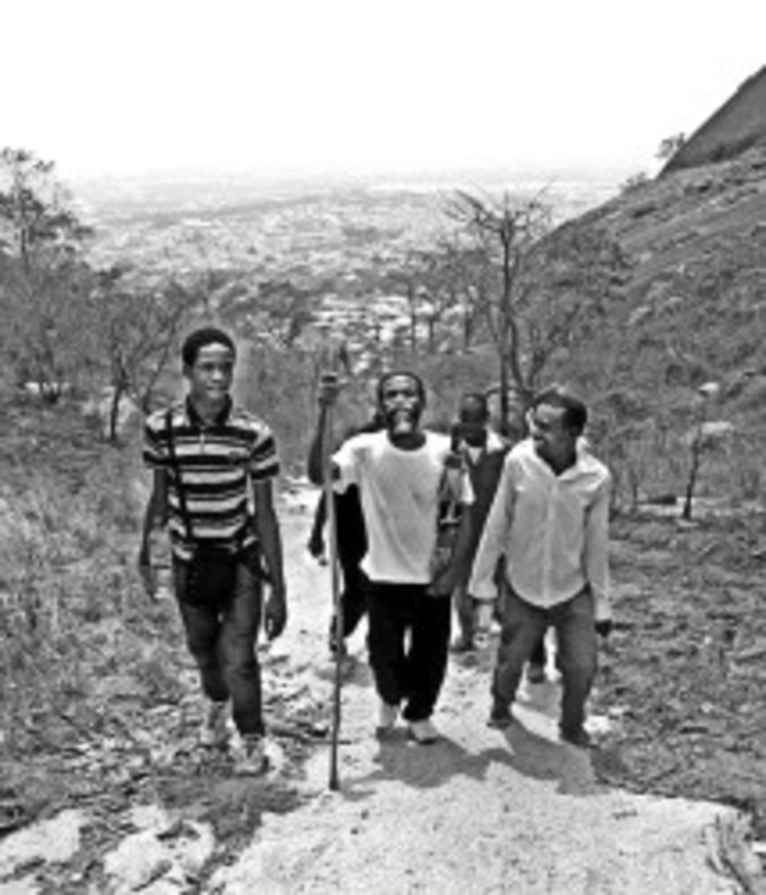 Igbo men ascend to the Jewish prayer area atop Byazhin Mountain. /Shai Afsai